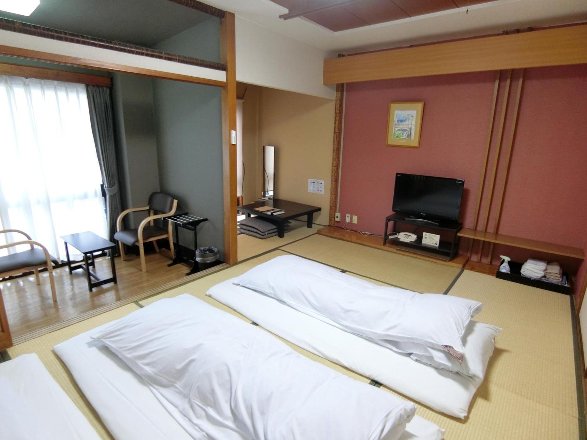 Nogami Honkan Beppu Habitación foto