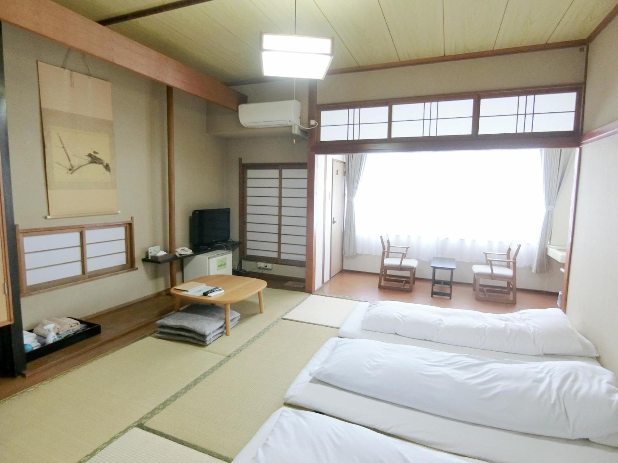 Nogami Honkan Beppu Habitación foto